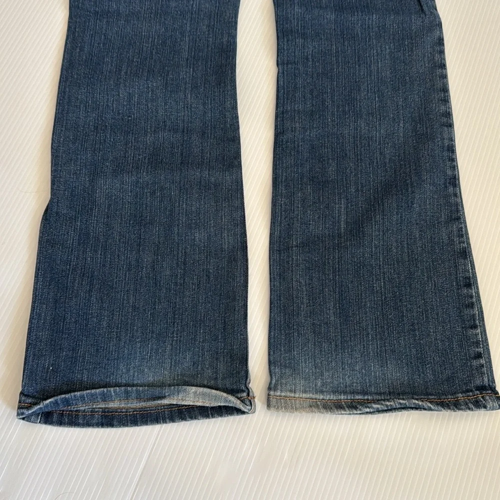 Old Navy bootcut blue jeans.  Girls size 12 plus